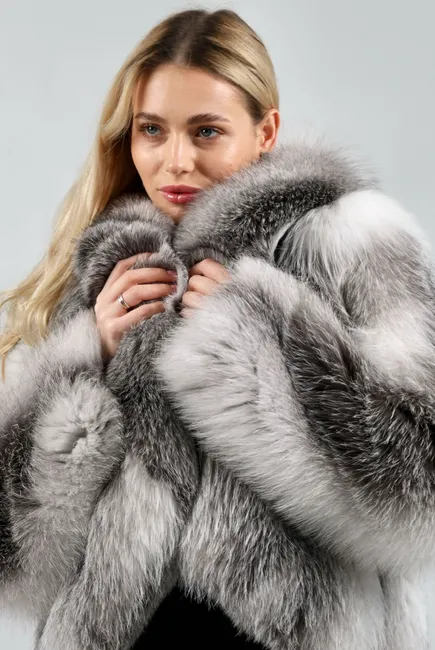 Fox fur coat in a shadow fawn shade