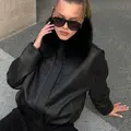Black leather bomber jacket for the transitional season