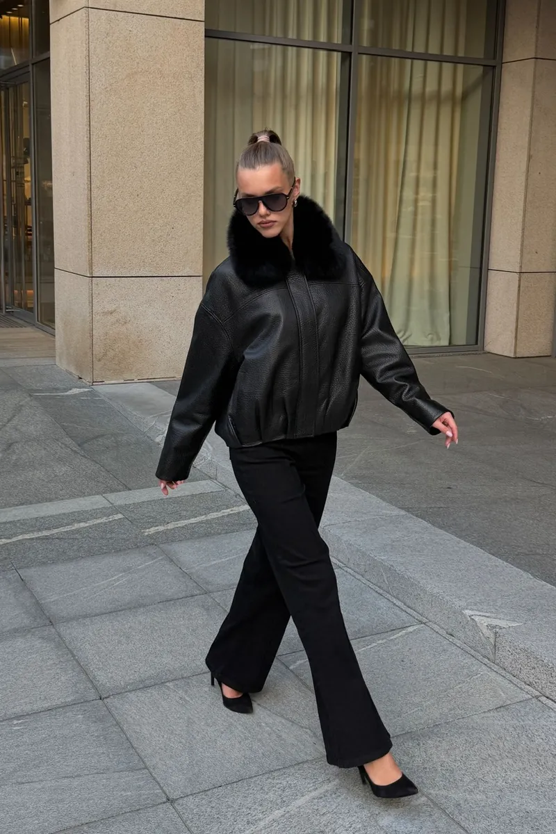 Black leather bomber jacket for the transitional season