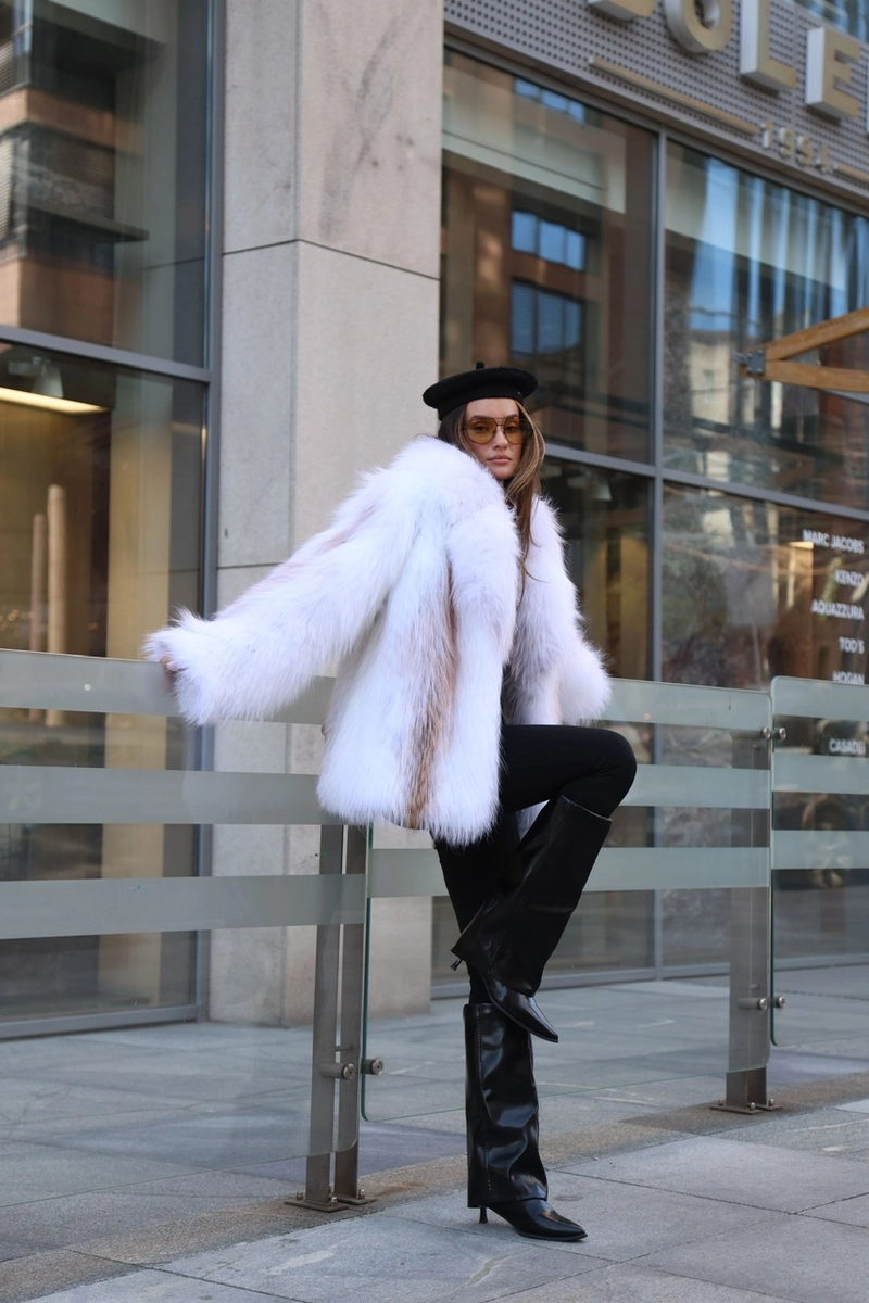 Fur coat made of Arctic fox in white color
