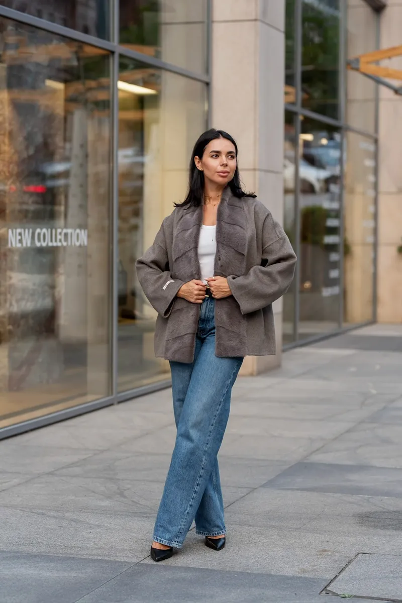 A laconic cashmere coat in grey-beige colour 