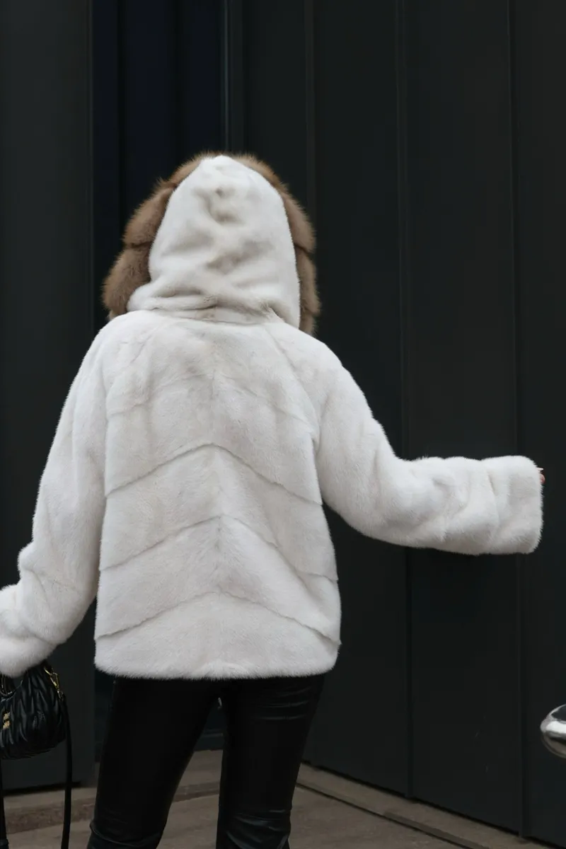 A mink coat with a hood and marten fur trim