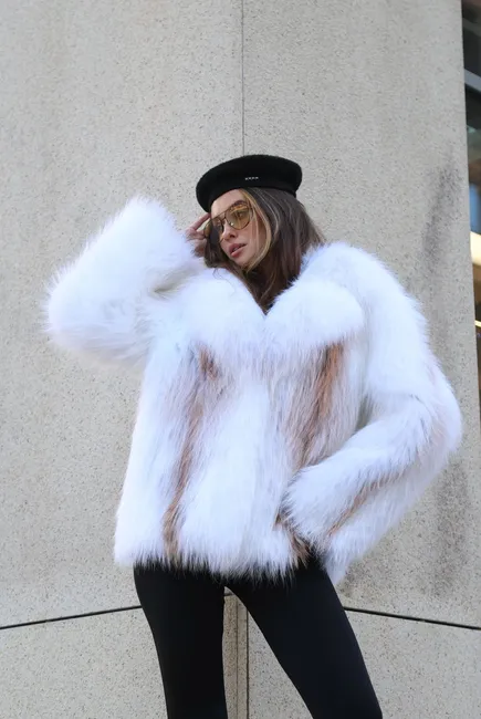 Fur coat made of Arctic fox in white color