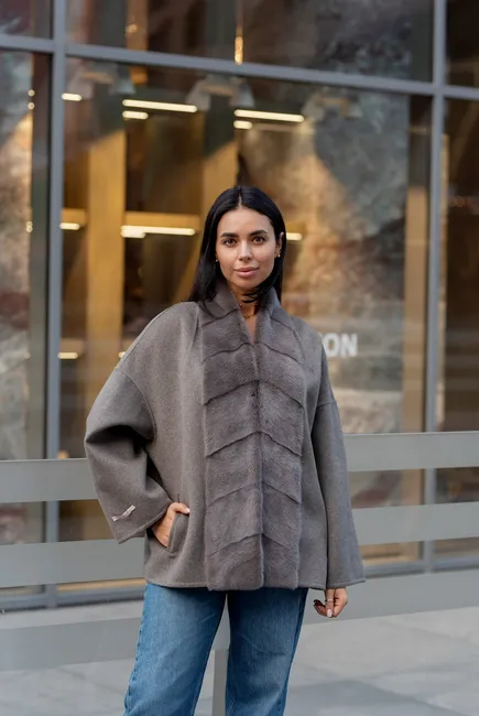 A laconic cashmere coat in grey-beige colour 