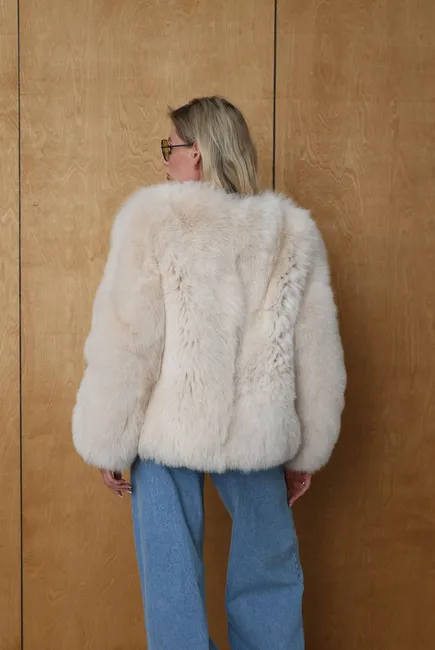 Beige Arctic fox fur coat without a collar