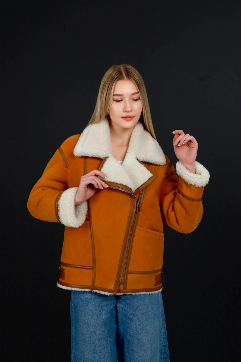 Red sheepskin coat made of curly sheepskin
