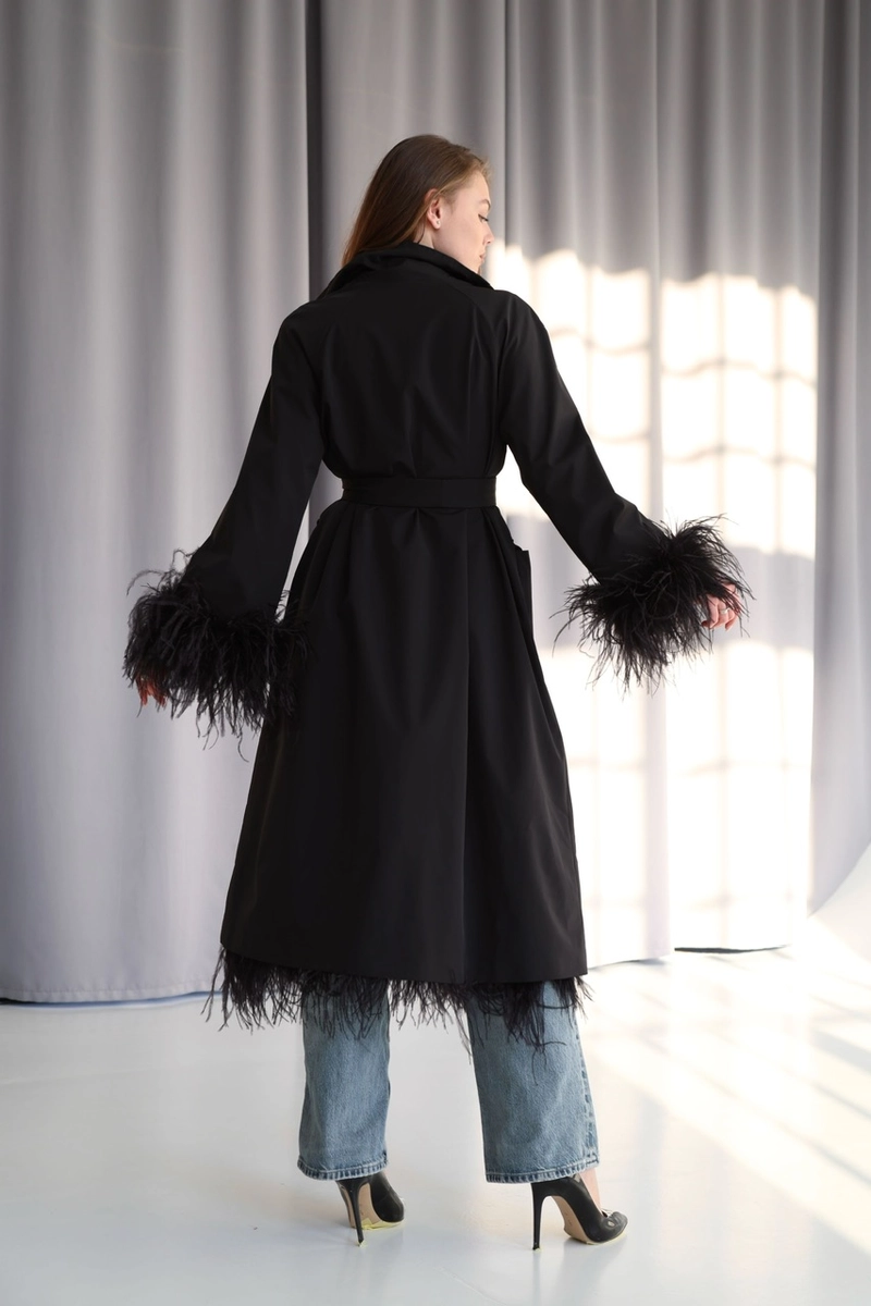 Trench coat made of raincoat fabric with ostrich feathers