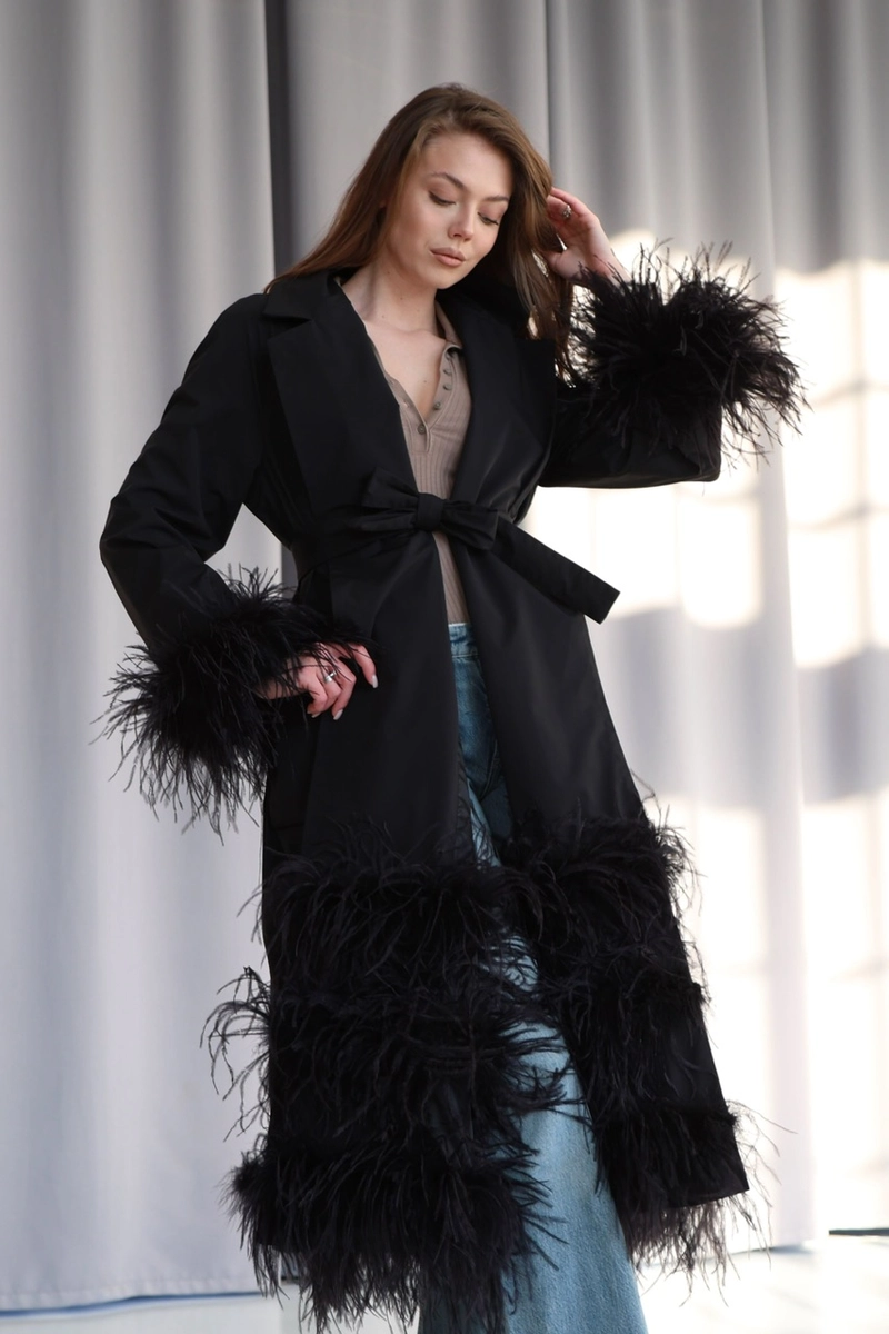 Trench coat made of raincoat fabric with ostrich feathers