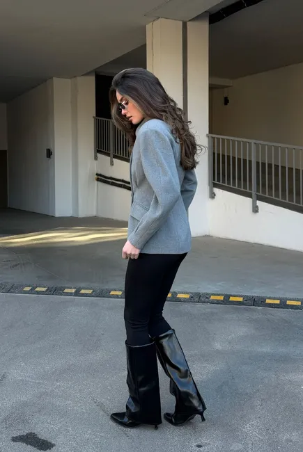 A cashmere jacket in a classic gray color.