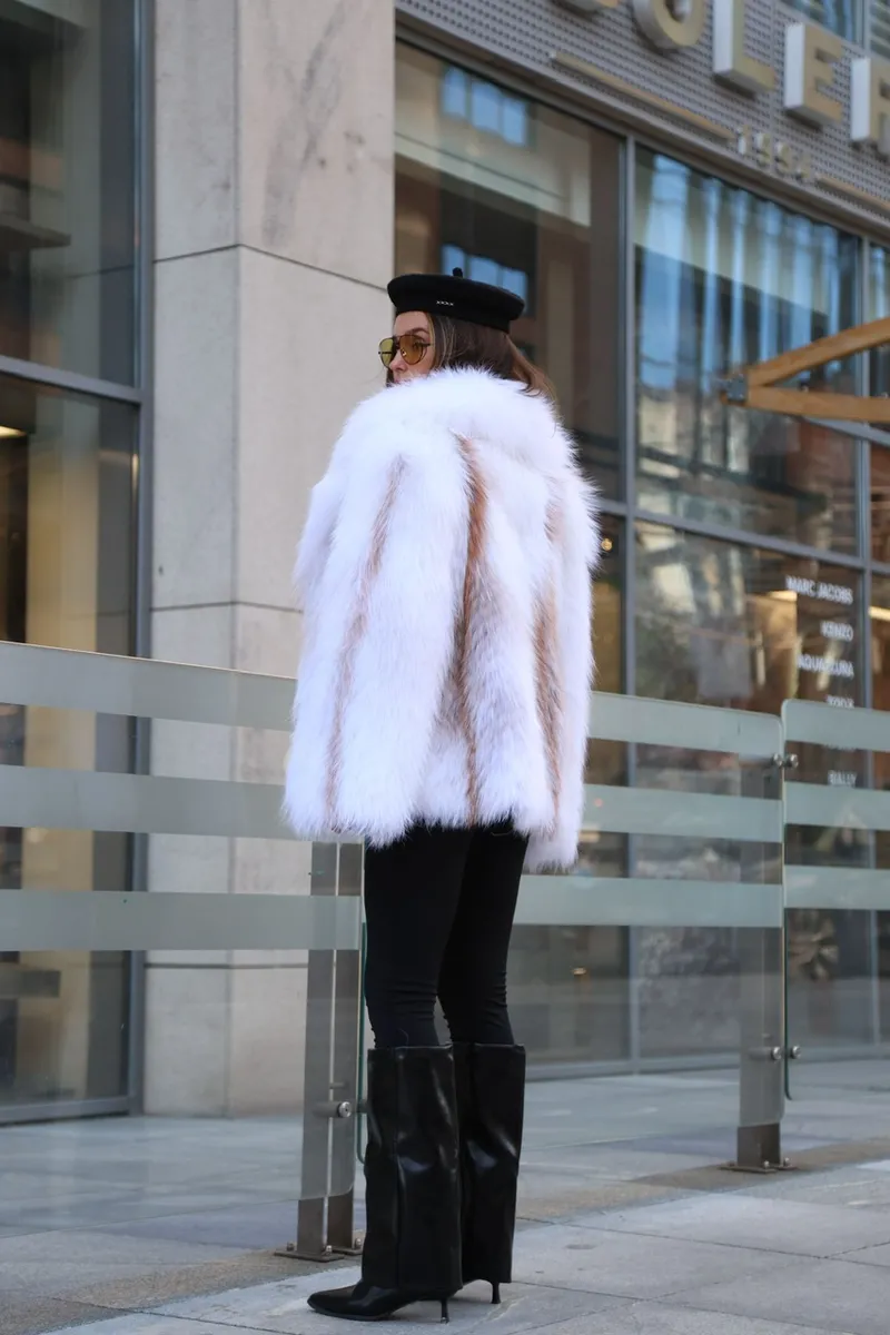 Fur coat made of Arctic fox in white color