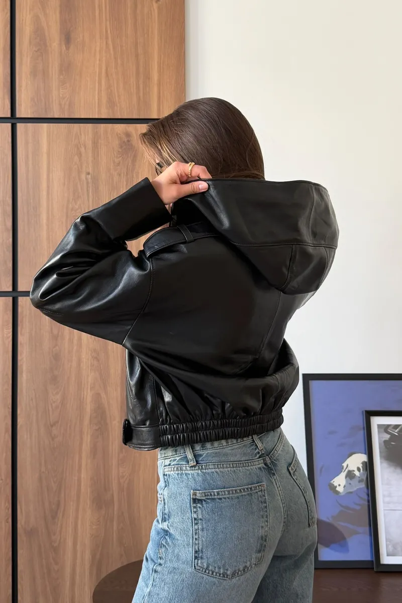 Bomber jacket made of smooth, glossy black leather