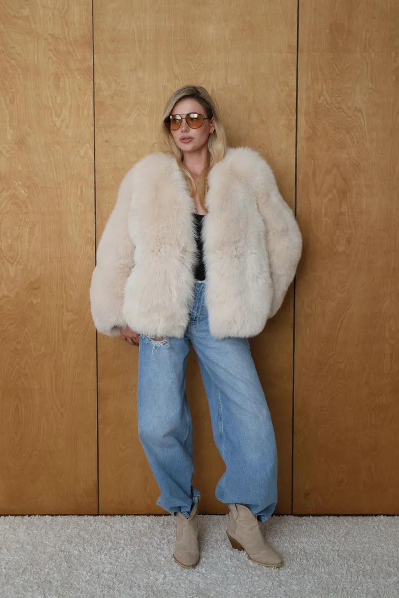 Beige Arctic fox fur coat without a collar