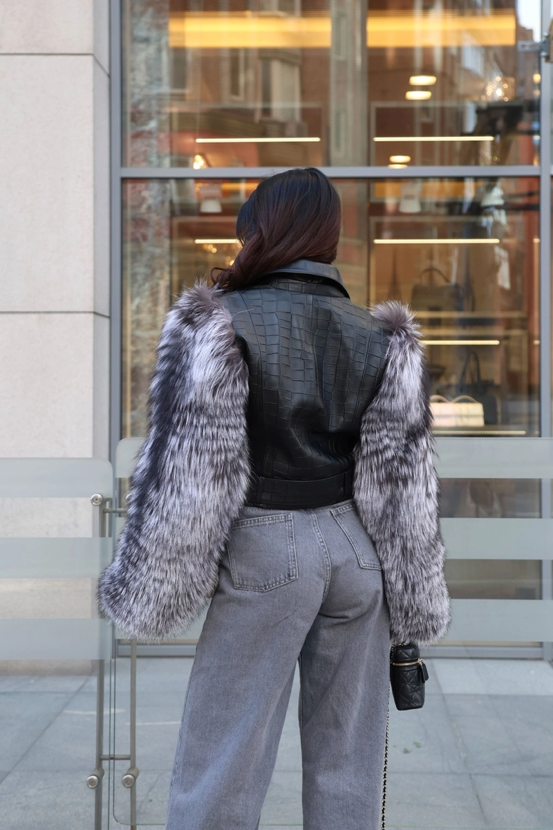 Leather jacket with fox fur sleeves