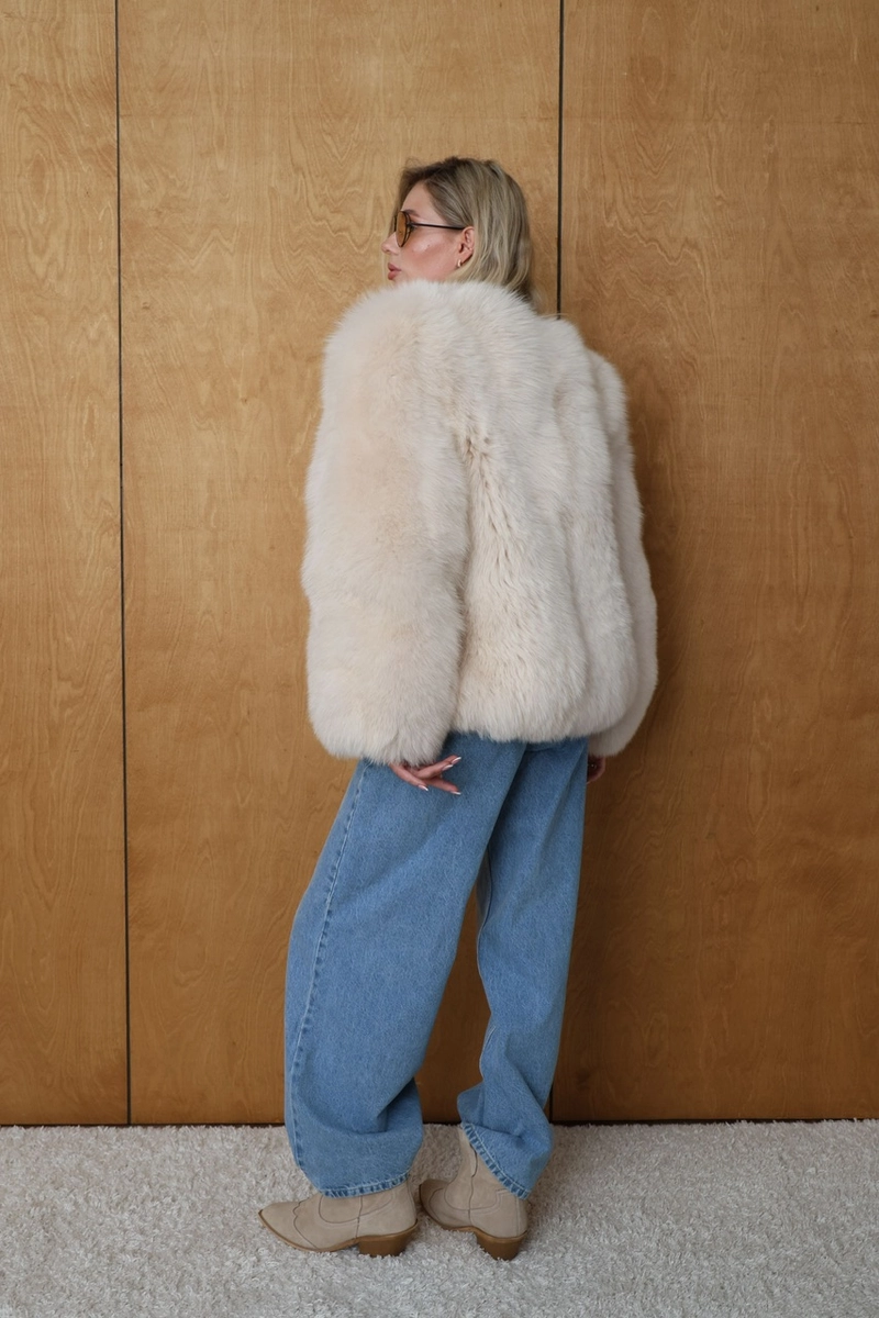 Beige Arctic fox fur coat without a collar