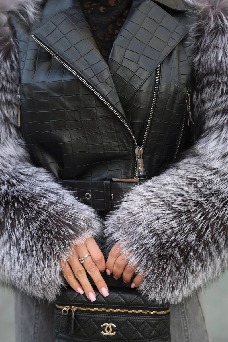 Leather jacket with fox fur sleeves