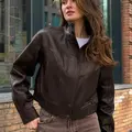 Cropped jacket made of textured leather in brown