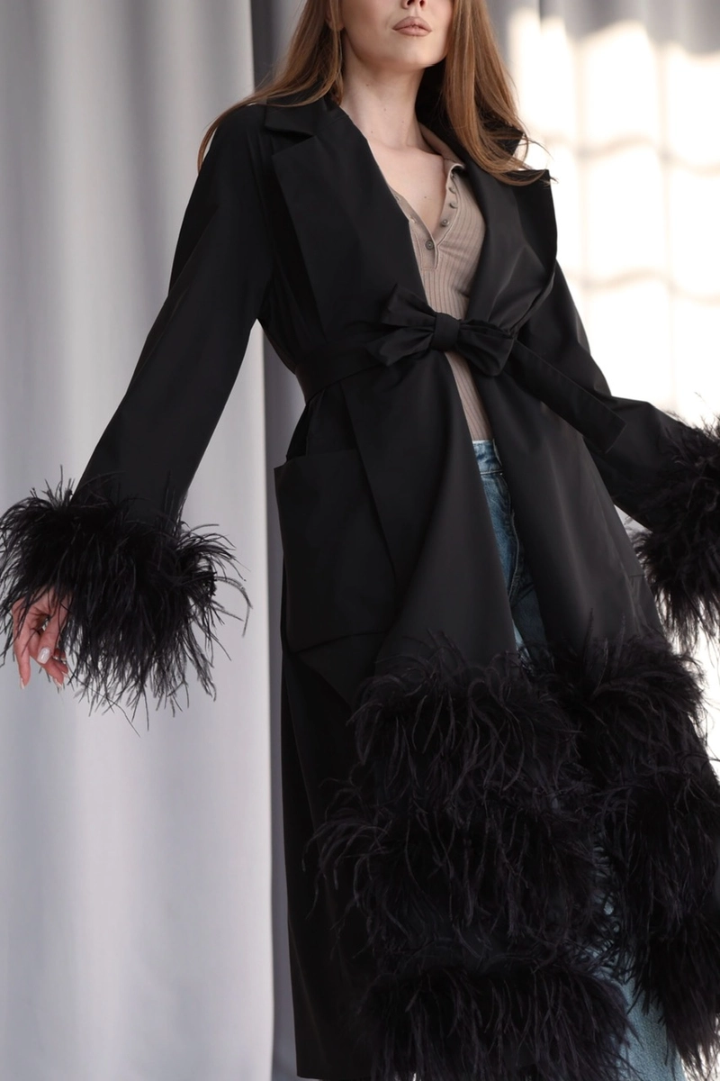 Trench coat made of raincoat fabric with ostrich feathers