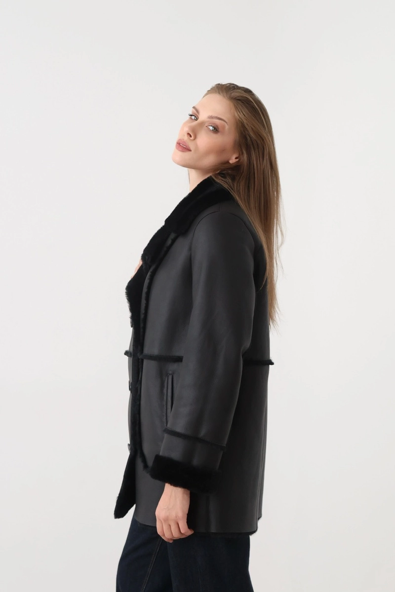 A basic merino sheepskin coat with buttons