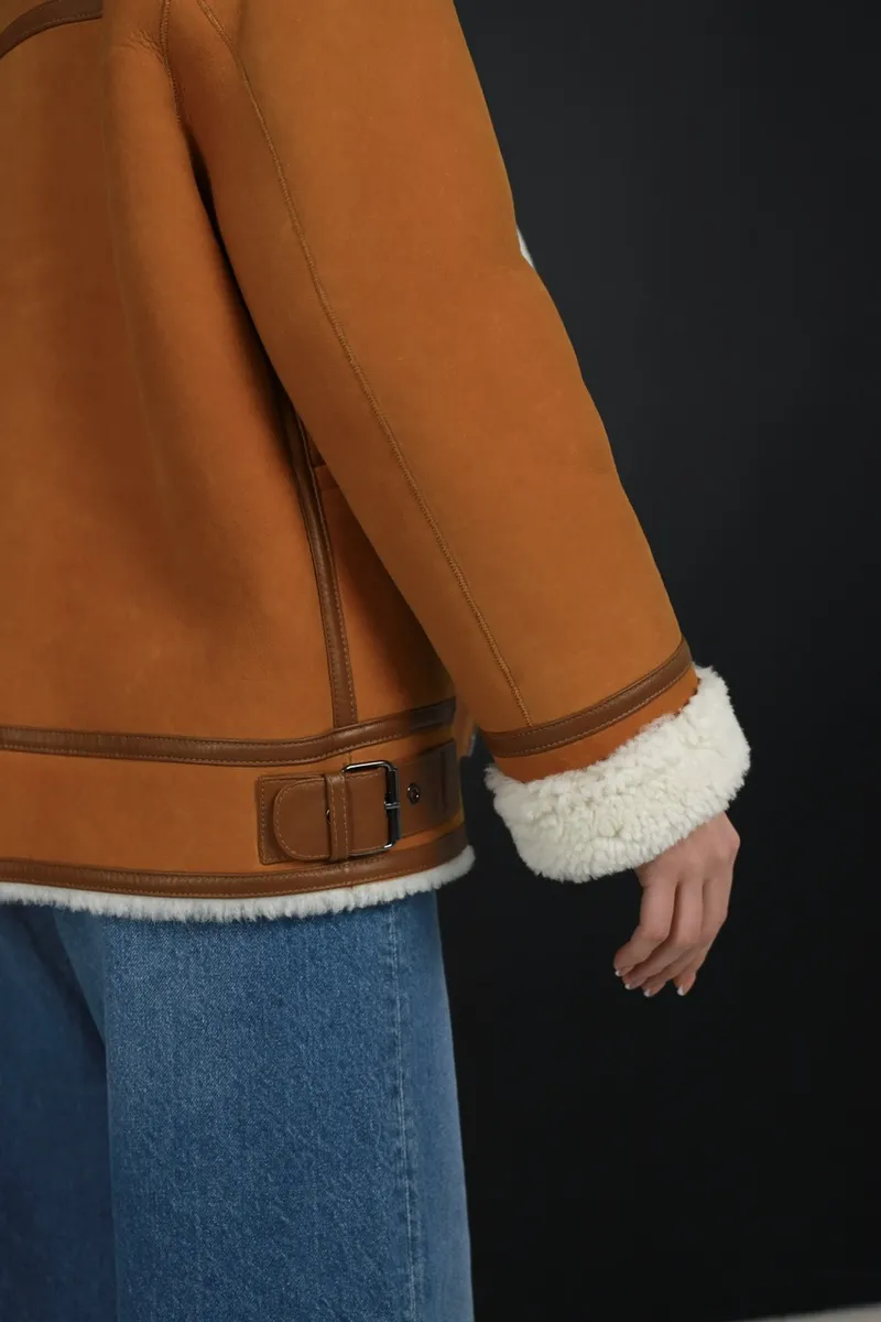 Red sheepskin coat made of curly sheepskin