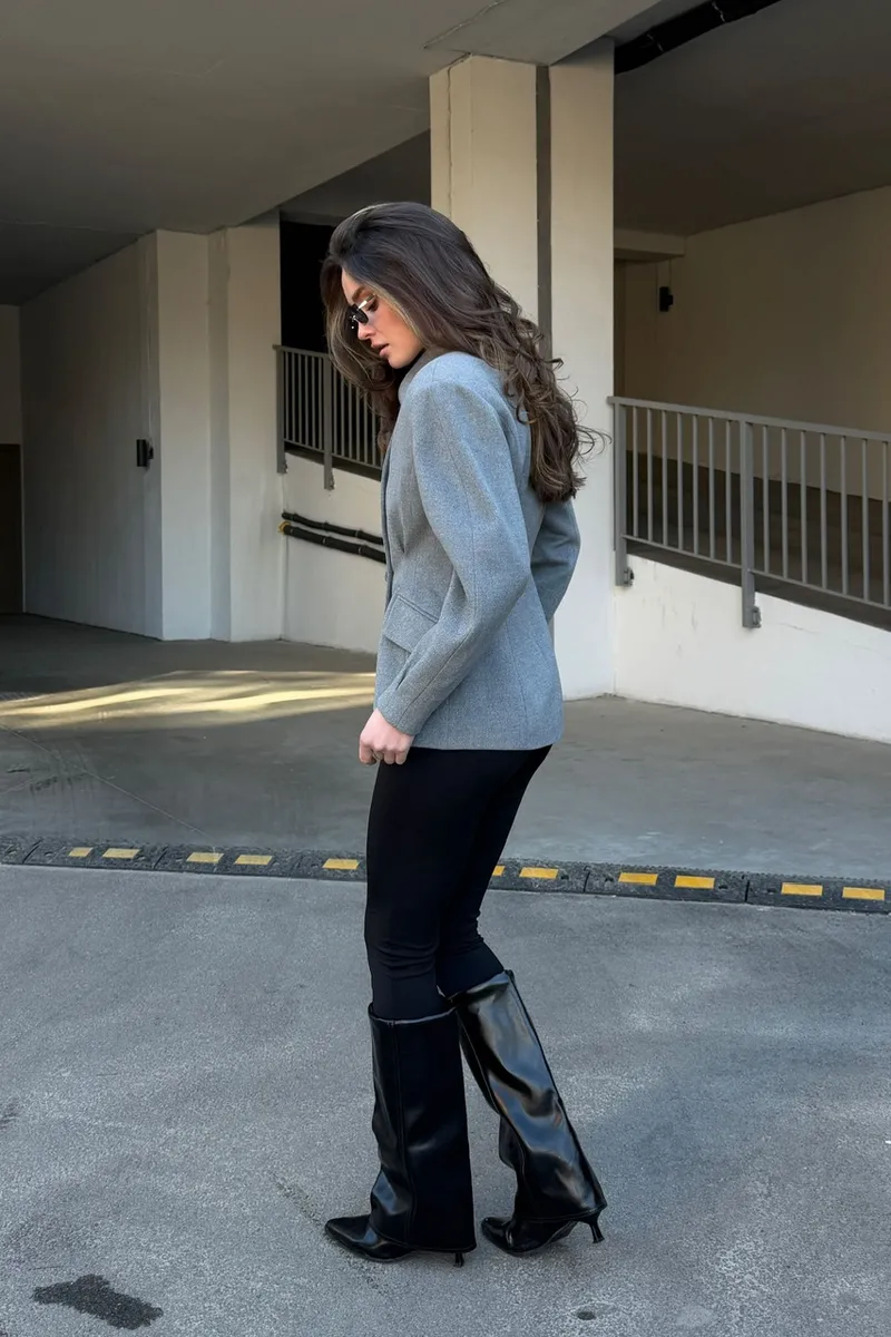 A cashmere jacket in a classic gray color.