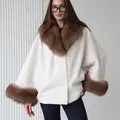 Вовняне пальто з хутром песця