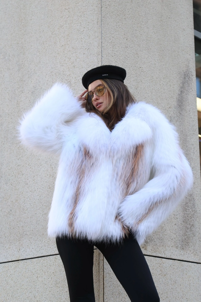 Fur coat made of Arctic fox in white color