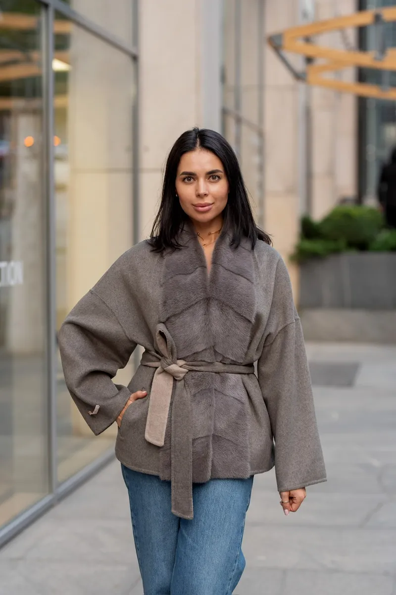 A laconic cashmere coat in grey-beige colour 