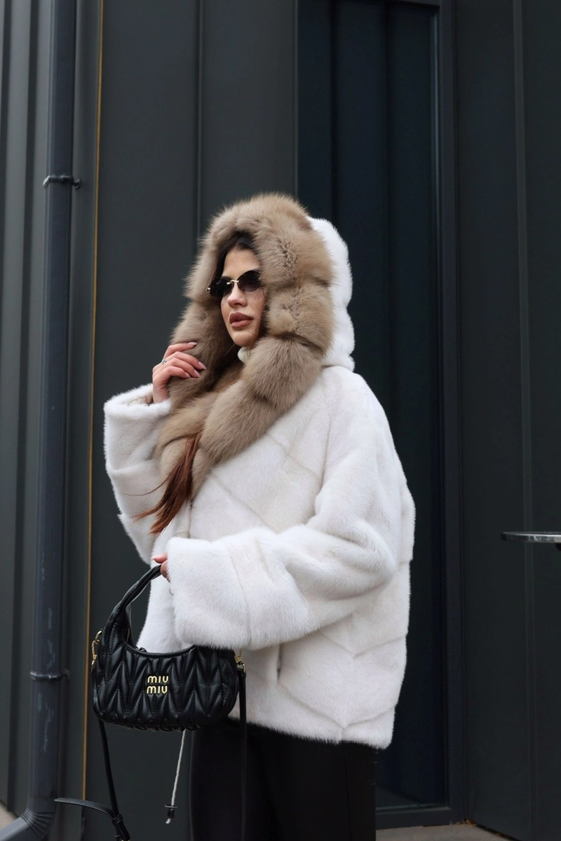A mink coat with a hood and marten fur trim