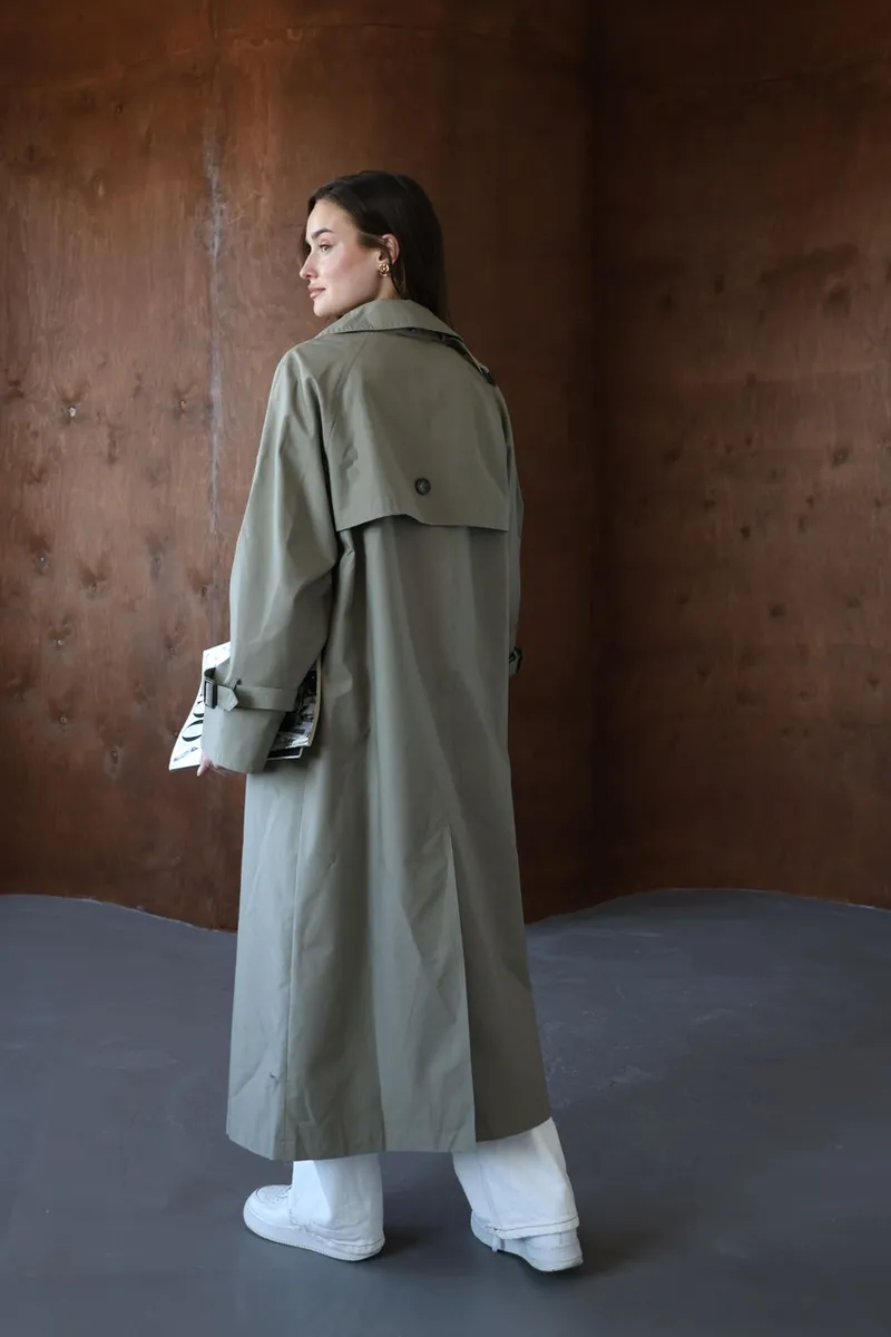 Double-breasted oversize trench coat in pistachio color