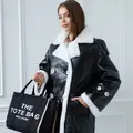 Sheepskin coat made of genuine patent leather and sheepskin