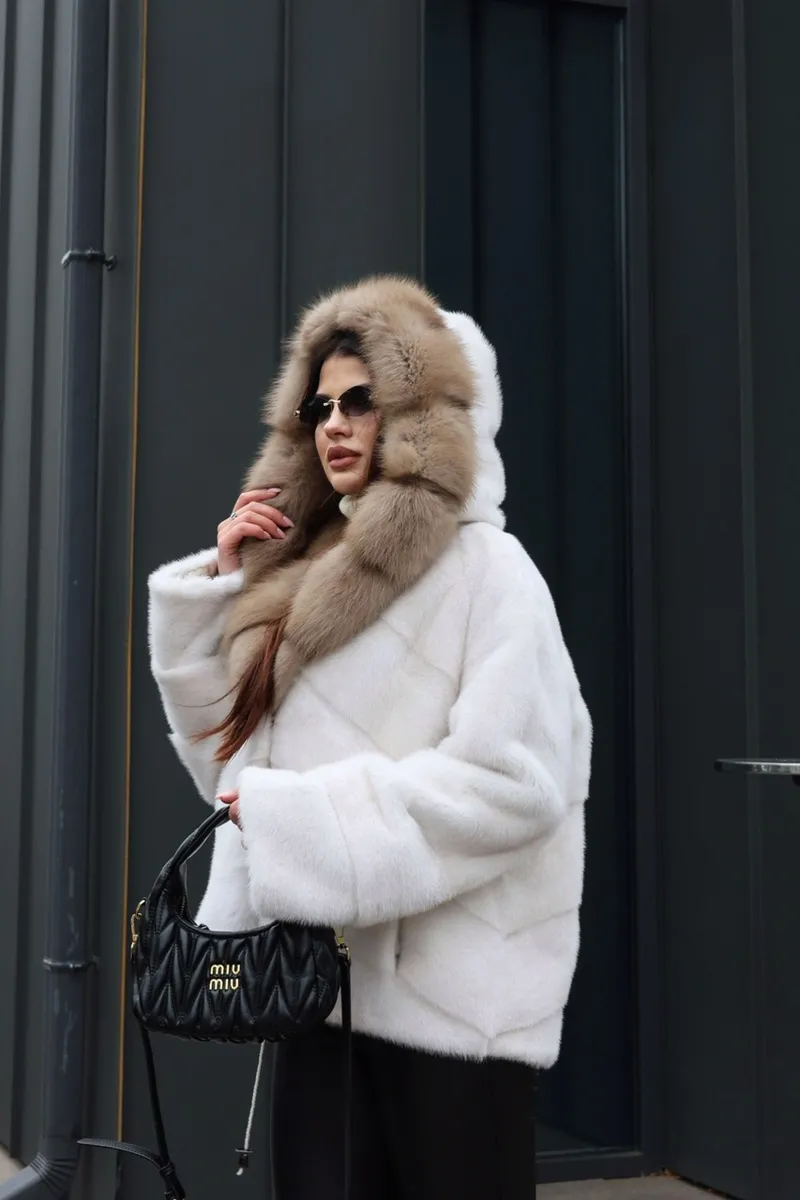 A mink coat with a hood and marten fur trim