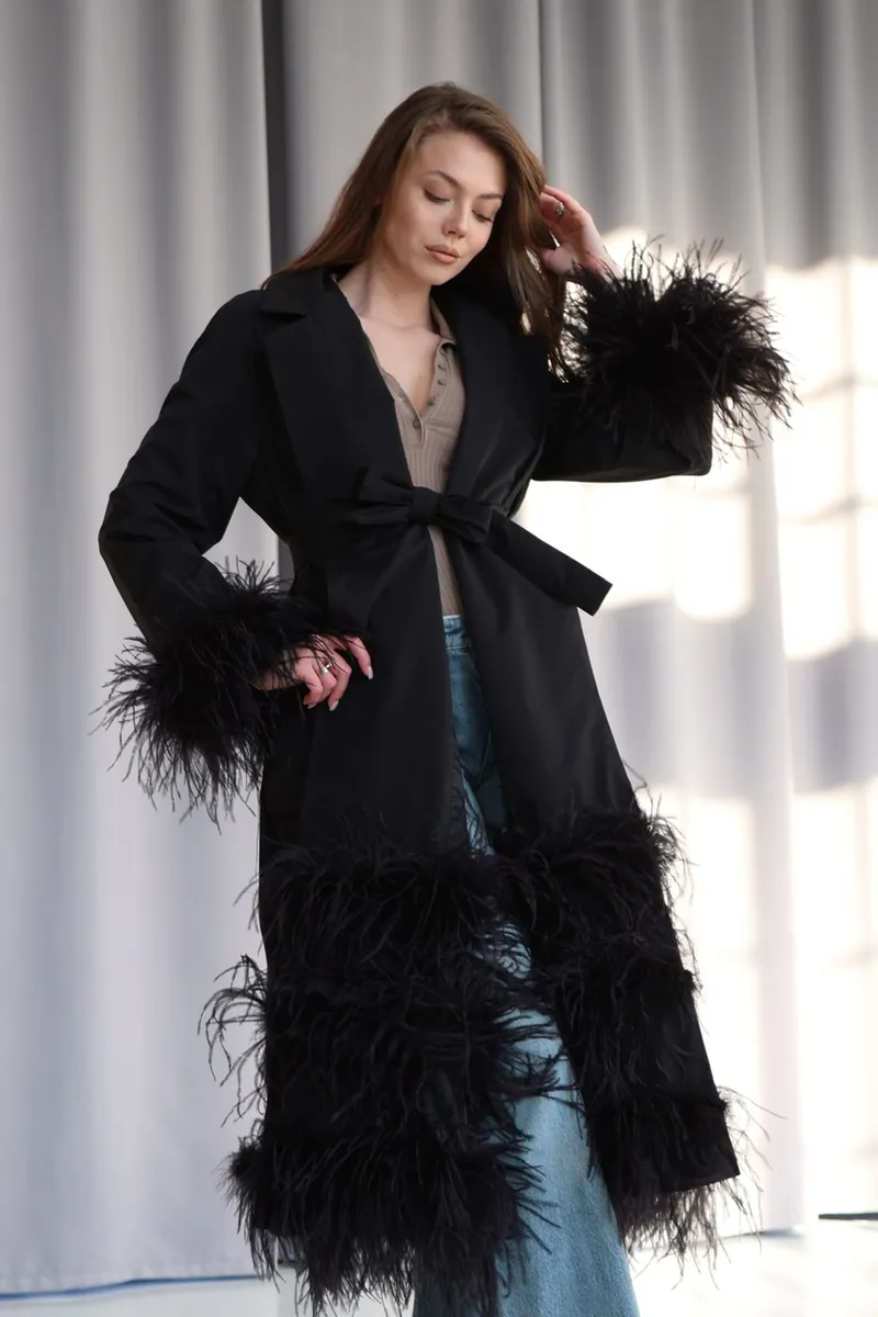 Trench coat made of raincoat fabric with ostrich feathers