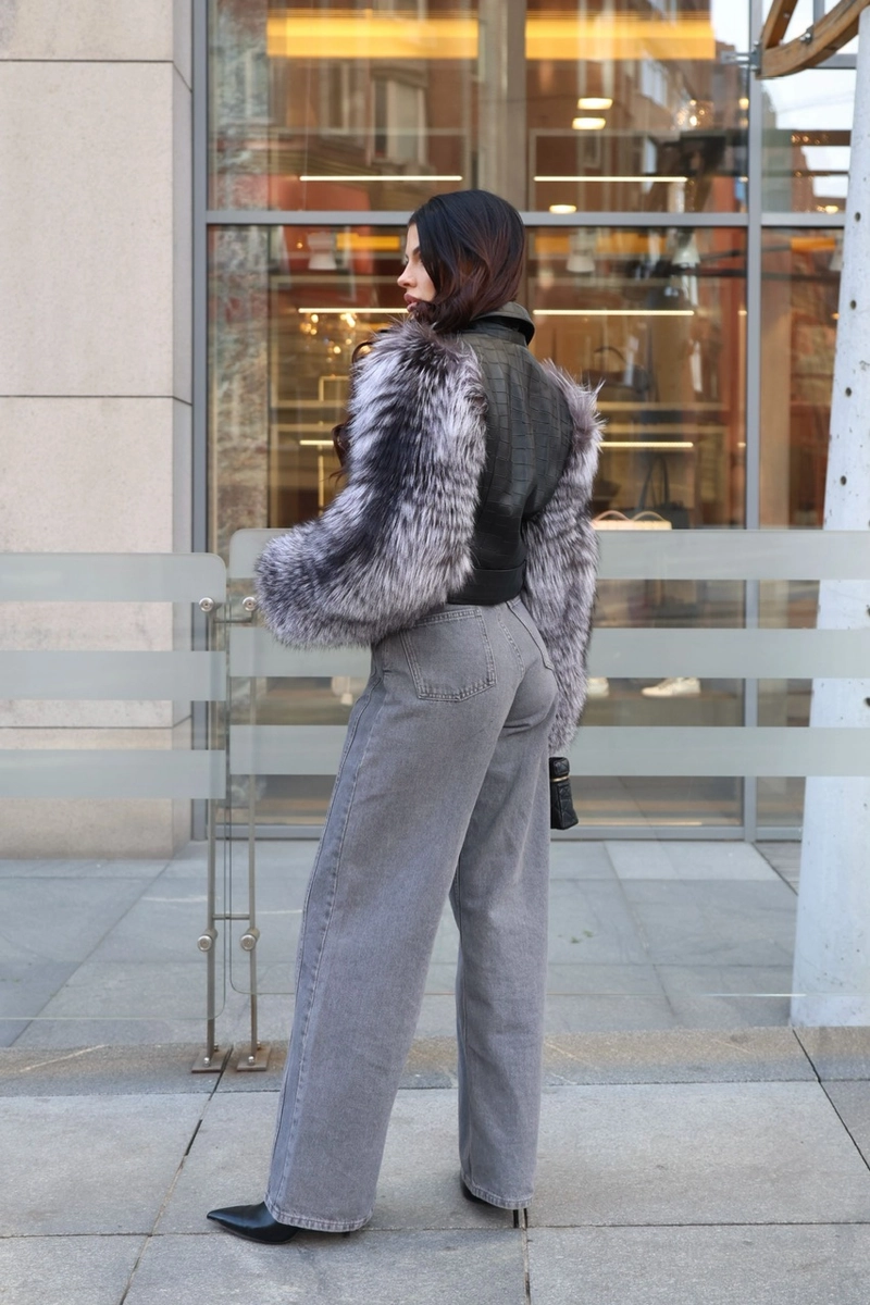 Leather jacket with fox fur sleeves