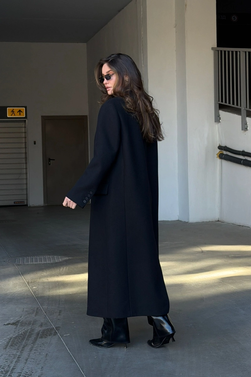 Black coat with a straight cut