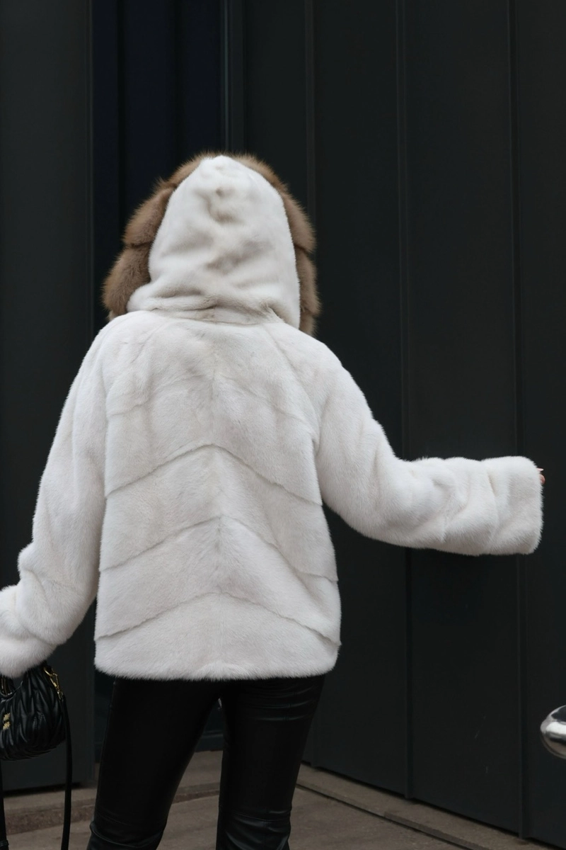 A mink coat with a hood and marten fur trim