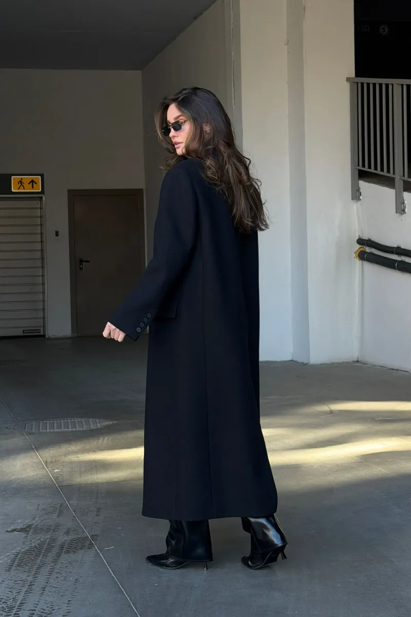 Black coat with a straight cut