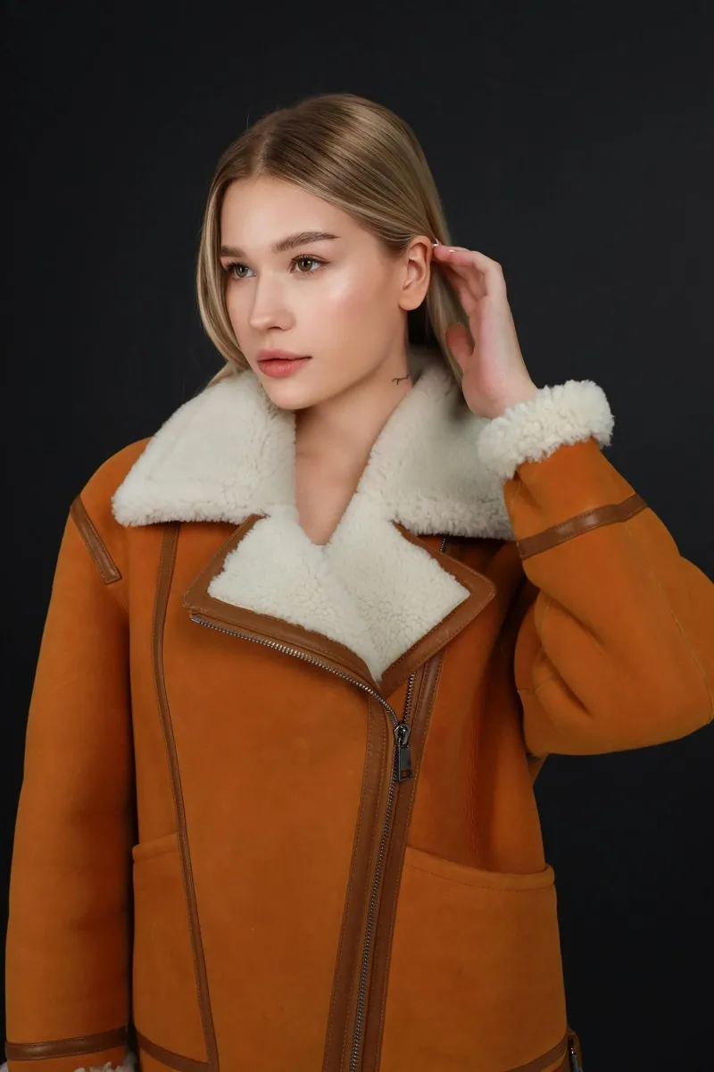 Red sheepskin coat made of curly sheepskin