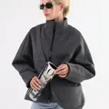 Cropped cashmere coat with a matching bag