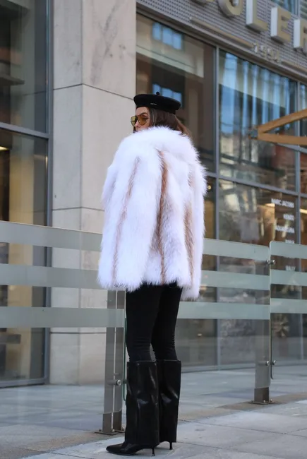 Fur coat made of Arctic fox in white color