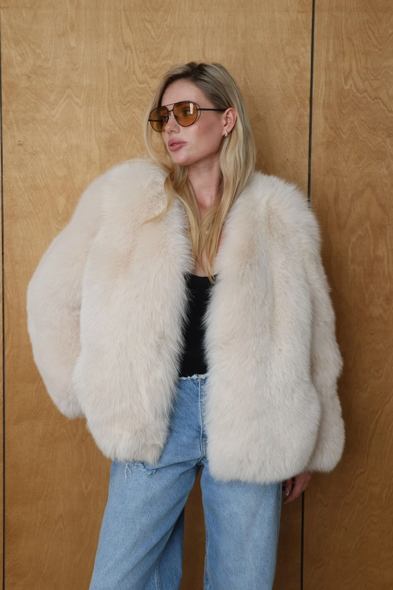 Beige Arctic fox fur coat without a collar
