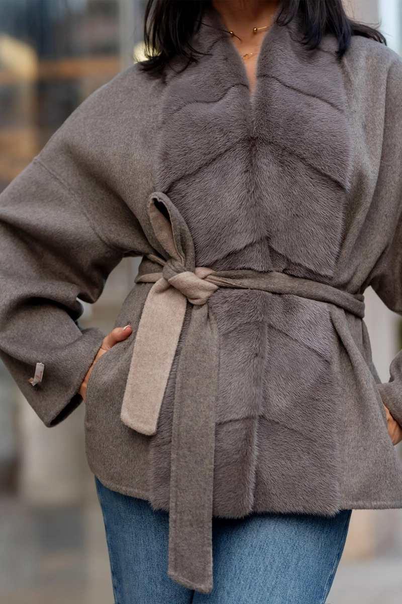 A laconic cashmere coat in grey-beige colour 