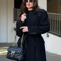 Black coat with a straight cut